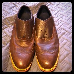 Cole Haan 15 W brown leather wing tip. No laces.